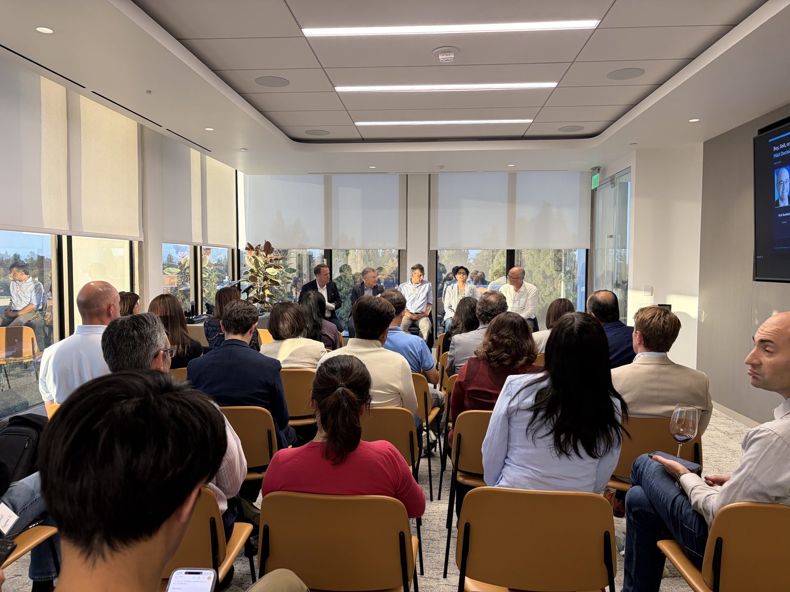 Attendees at an Open Future Forum M&A panel discussion hosted with Foley & Lardner
